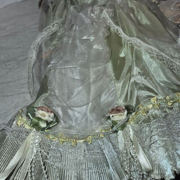 Heirloom Treasure Doll, Dark Long Curley Hair with Green Dress and Bow on Front - Picture 8 of 10